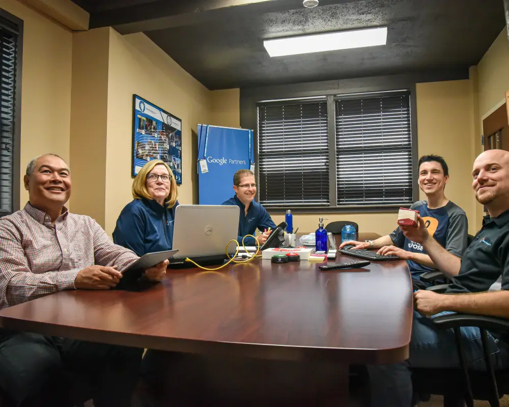 About Sharp Innovations — team working together in our office