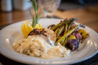 a fancy meal on a dinner plate