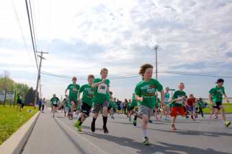 children running in a charity race