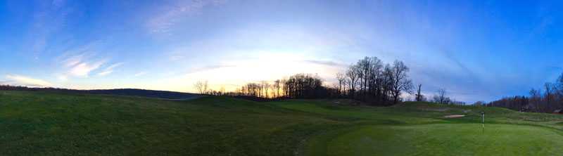 panorama of a golf course at dawn